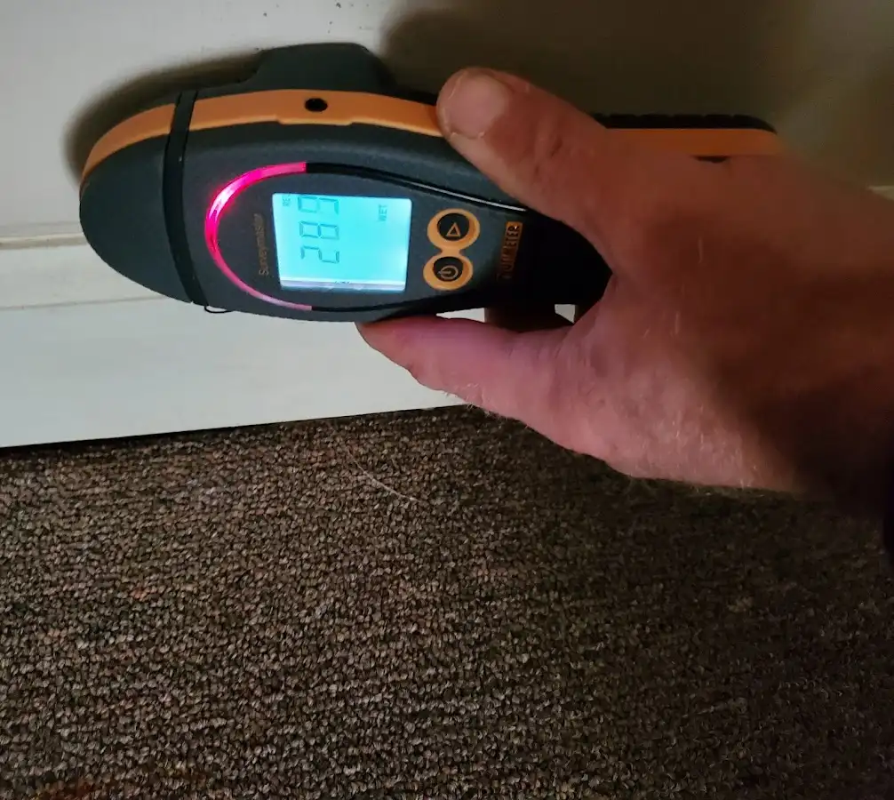 Moisture detection at baseboard during Burst Pipe Cleanup in Henryetta